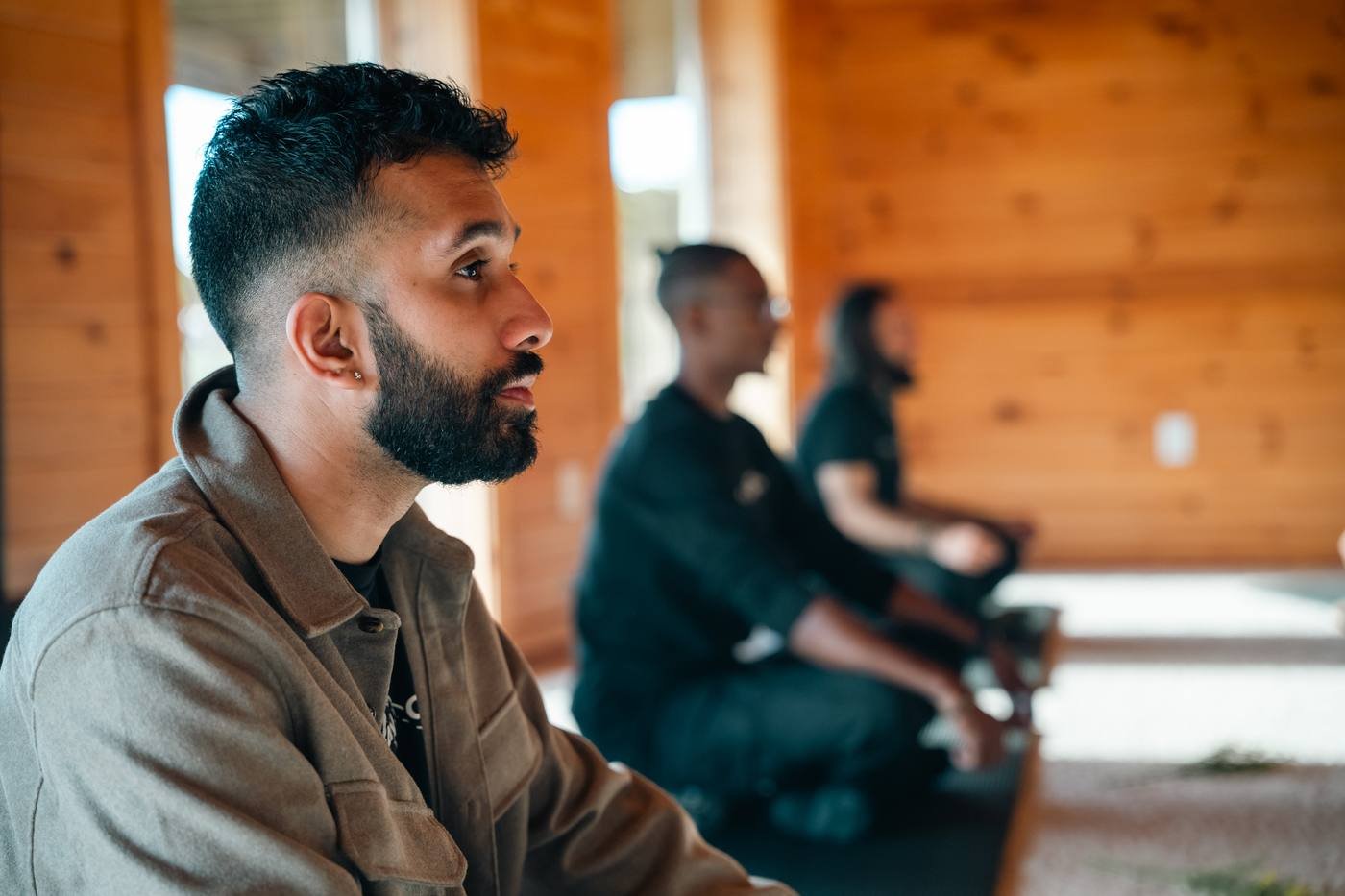 A man listening closely during a session